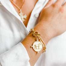 Modern Paperclip Toggle Bracelet featuring a Pearl Surround Champion Horse Medallion