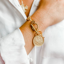 Circle Loop Toggle Bracelet featuring an Ancient Coin with Clover Top