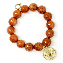 Faceted Goldstone with Gold Lucky Horseshoe