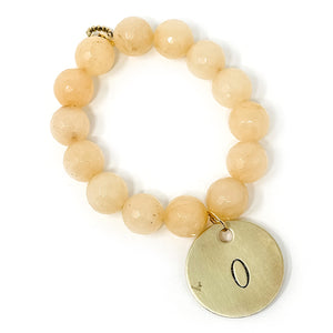 Faceted Creamsicle Agate with Letter O
