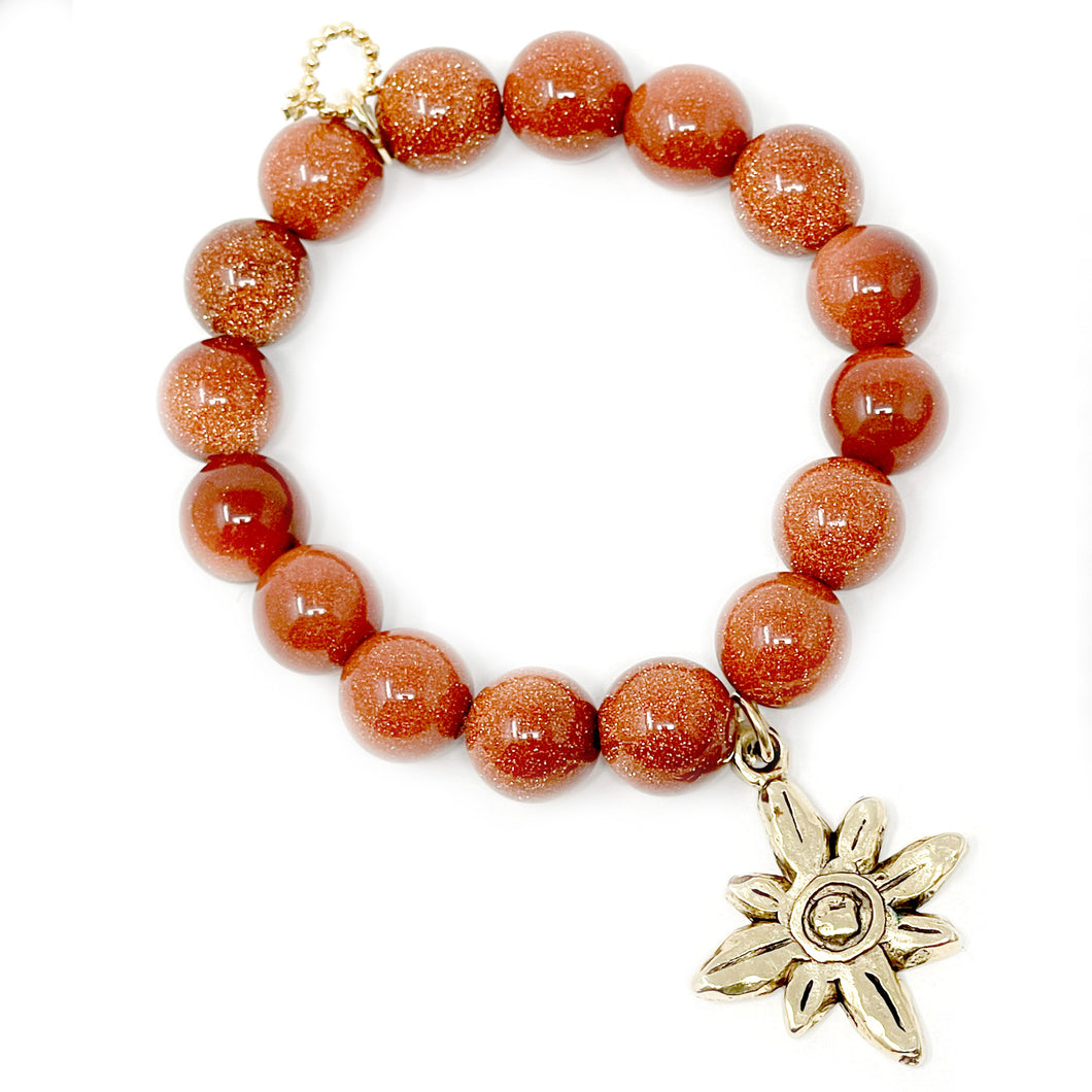 12mm Amber Goldstone with Gold Starburst