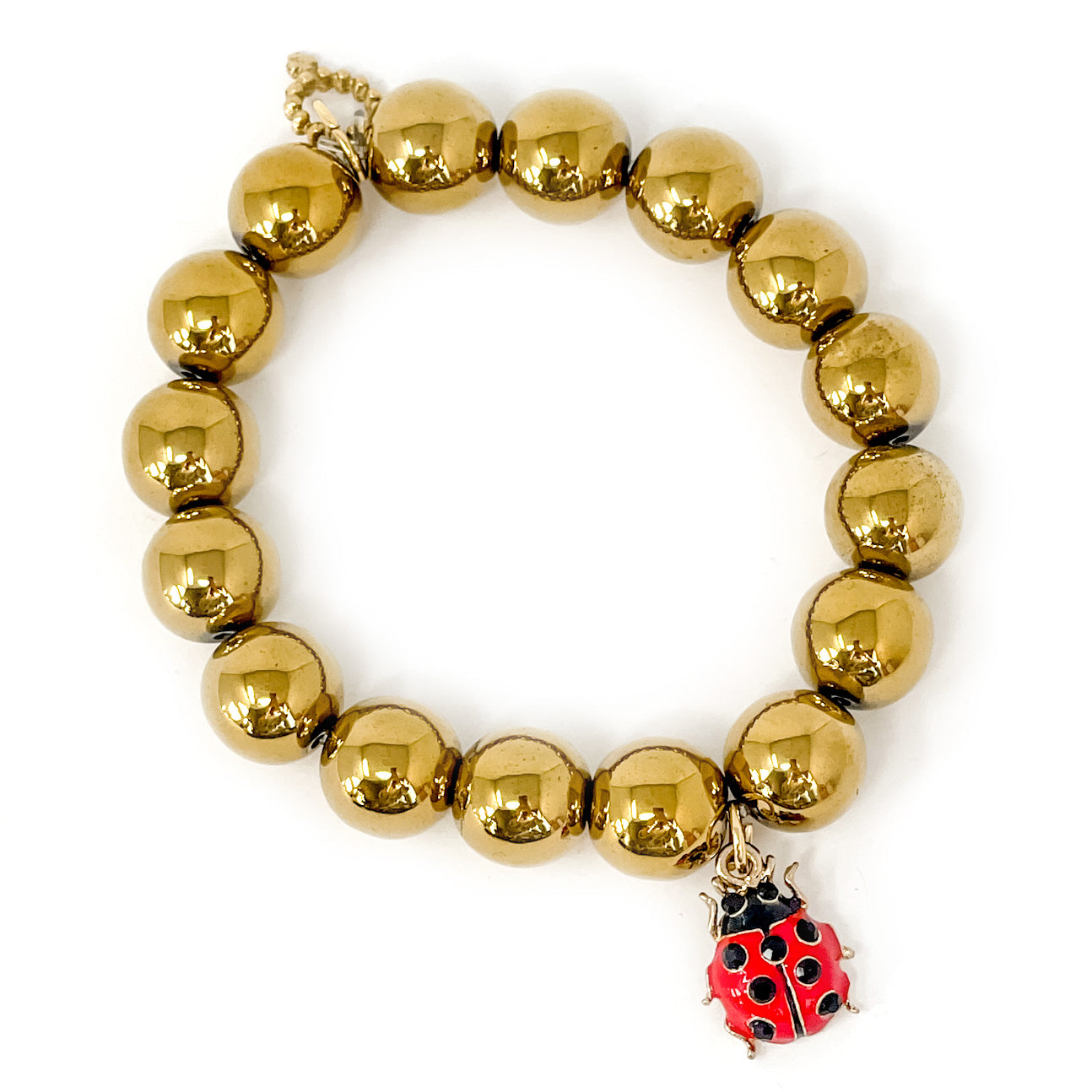 12mm Gold Hematite with Enameled Ladybug