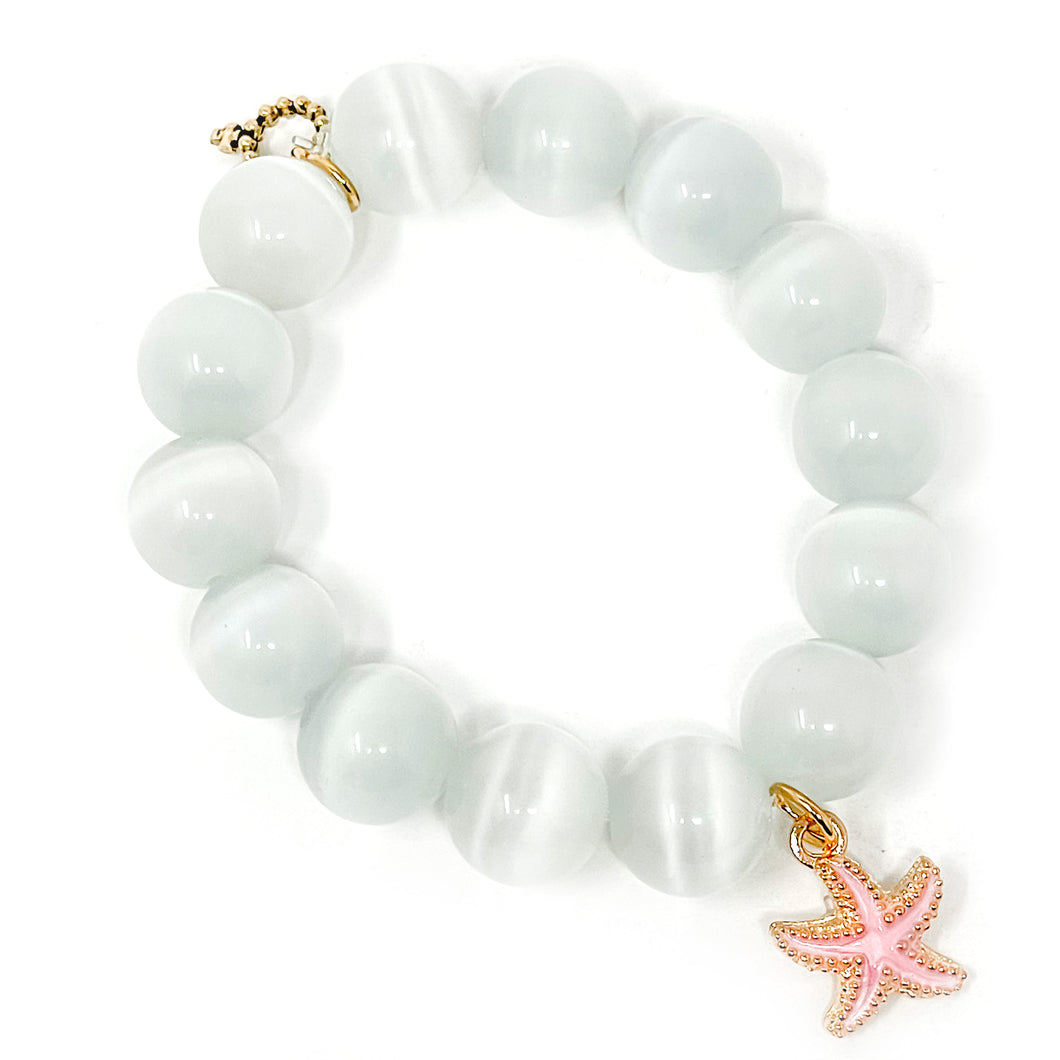 White Calicte with a Pink Enameled Starfish