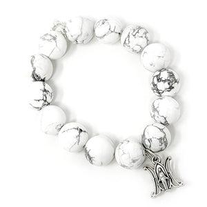 Bright White Howlite with a Silver Blessed Mother