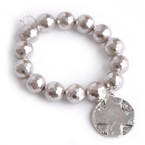 Faceted Mother of Pearl paired with a Silver Lord's Prayer medal