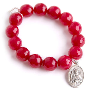 Faceted Ruby Red Jade paired with a Saint Nicholas medal