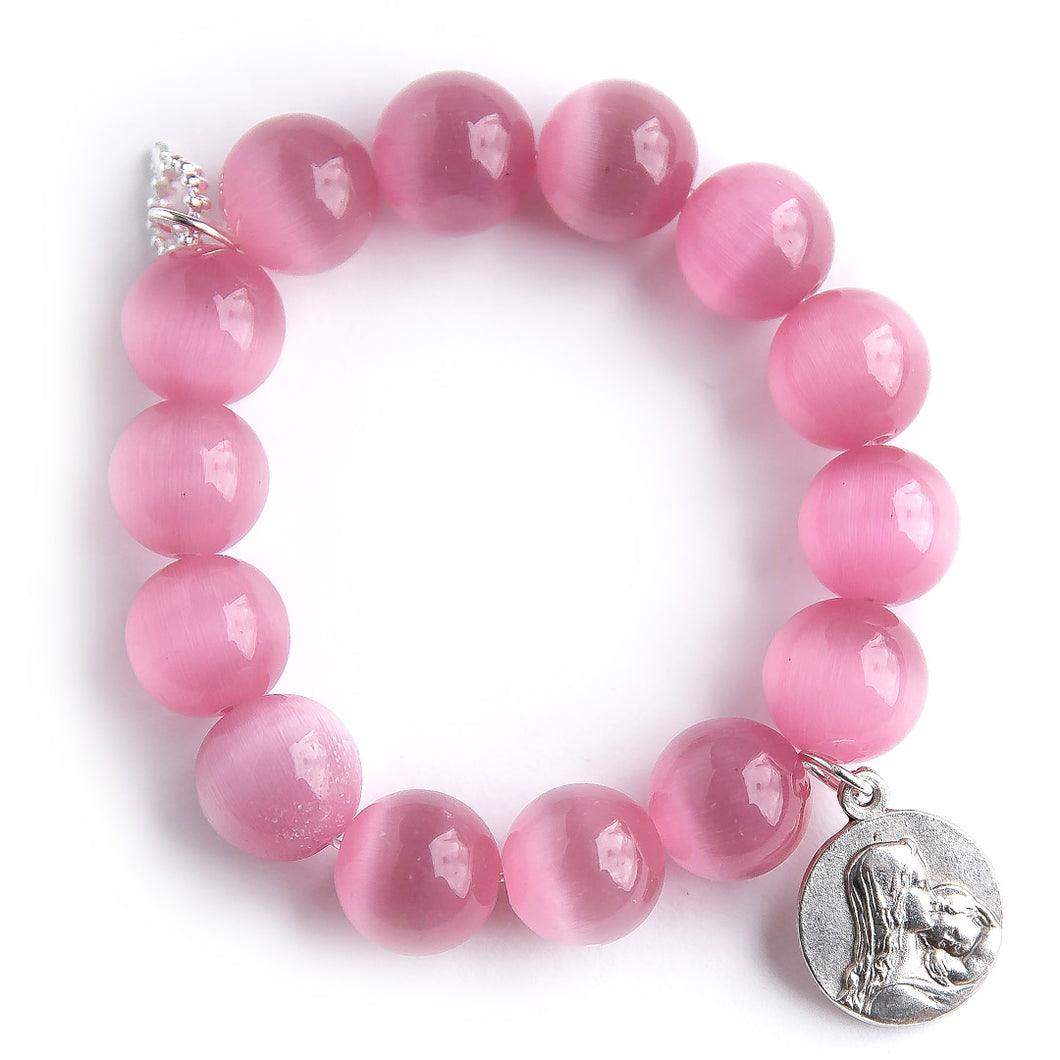 Blush Calcite paired with a Mother & Child medal