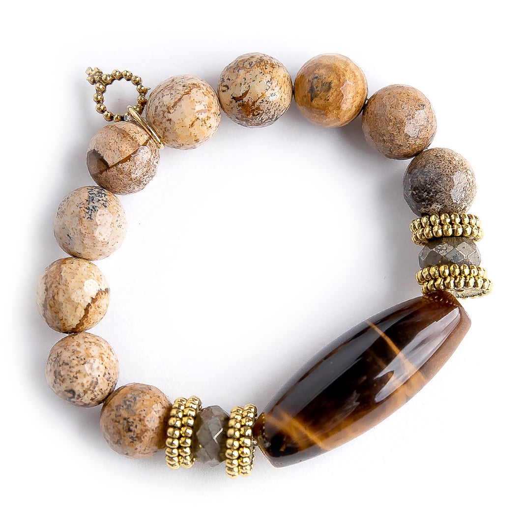 12mm Faceted Picture Jasper paired with Brass Accents and a Tiger Eye Barrel