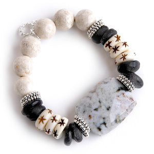 Pebble Jasper Statement Slice with starry accents paired with Cream Coral