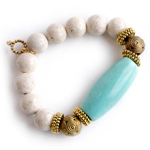 Seafoam Agate Barrel with Ornate Brass Accents paired with Cream Coral