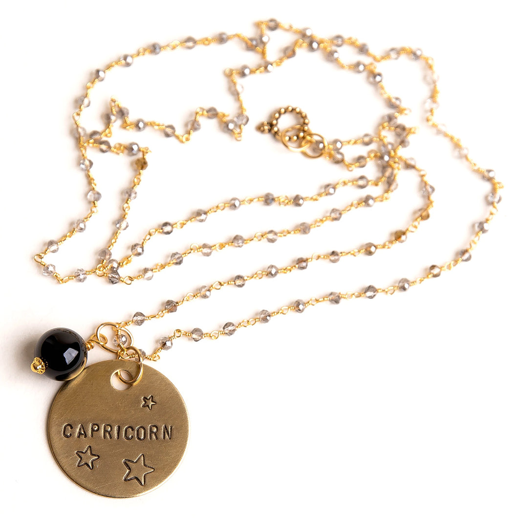 Smokey quartz rosary chain necklace with black onyx accent and hand stamped bronze Capricorn medal