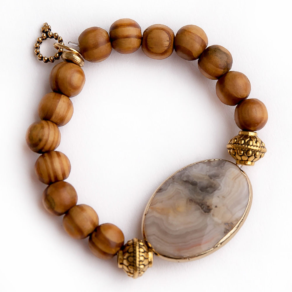 Olive Wood paired with desert sand agate statement slice and gold accent beads