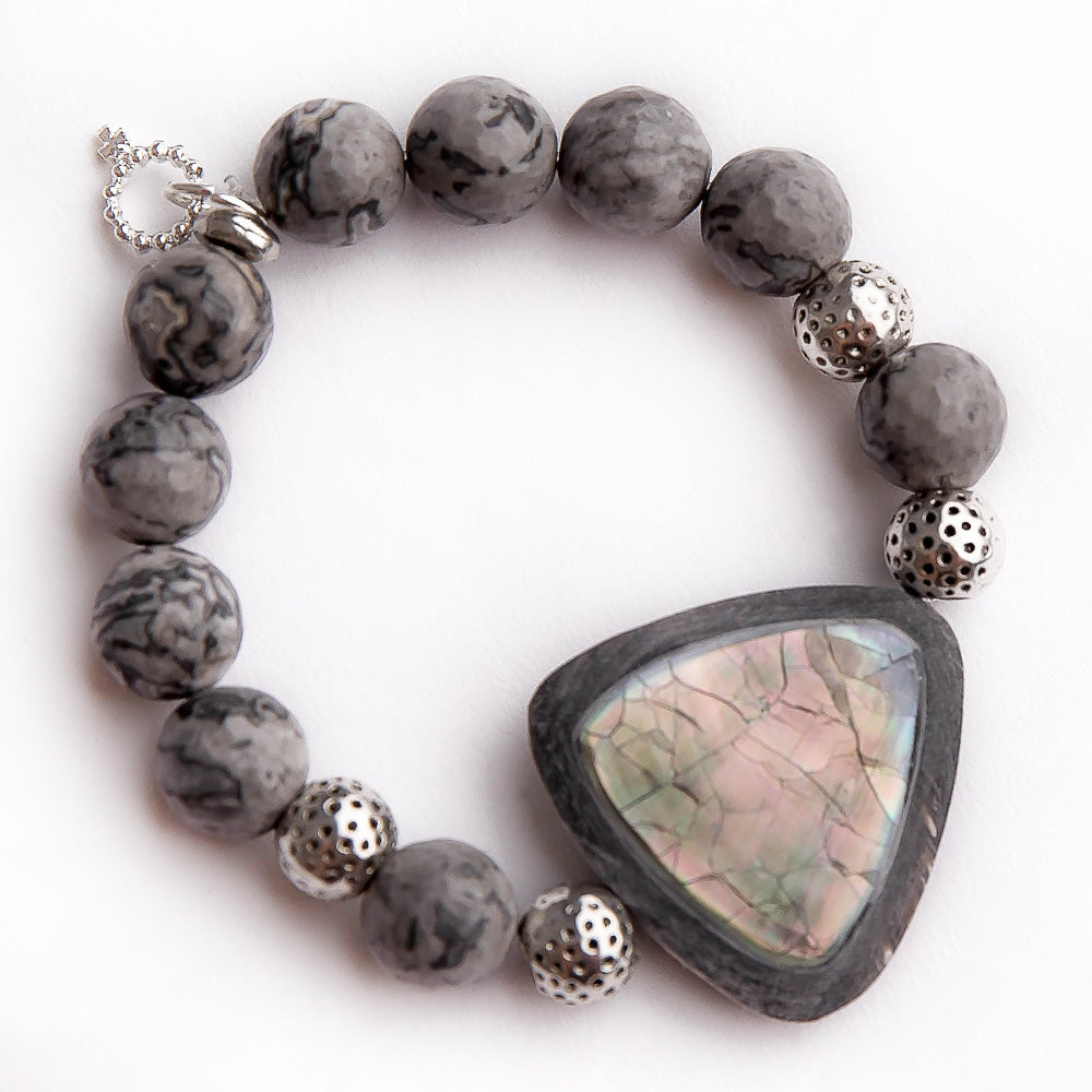 Faceted silver leaf agate paired with abalone and driftwood statement slice