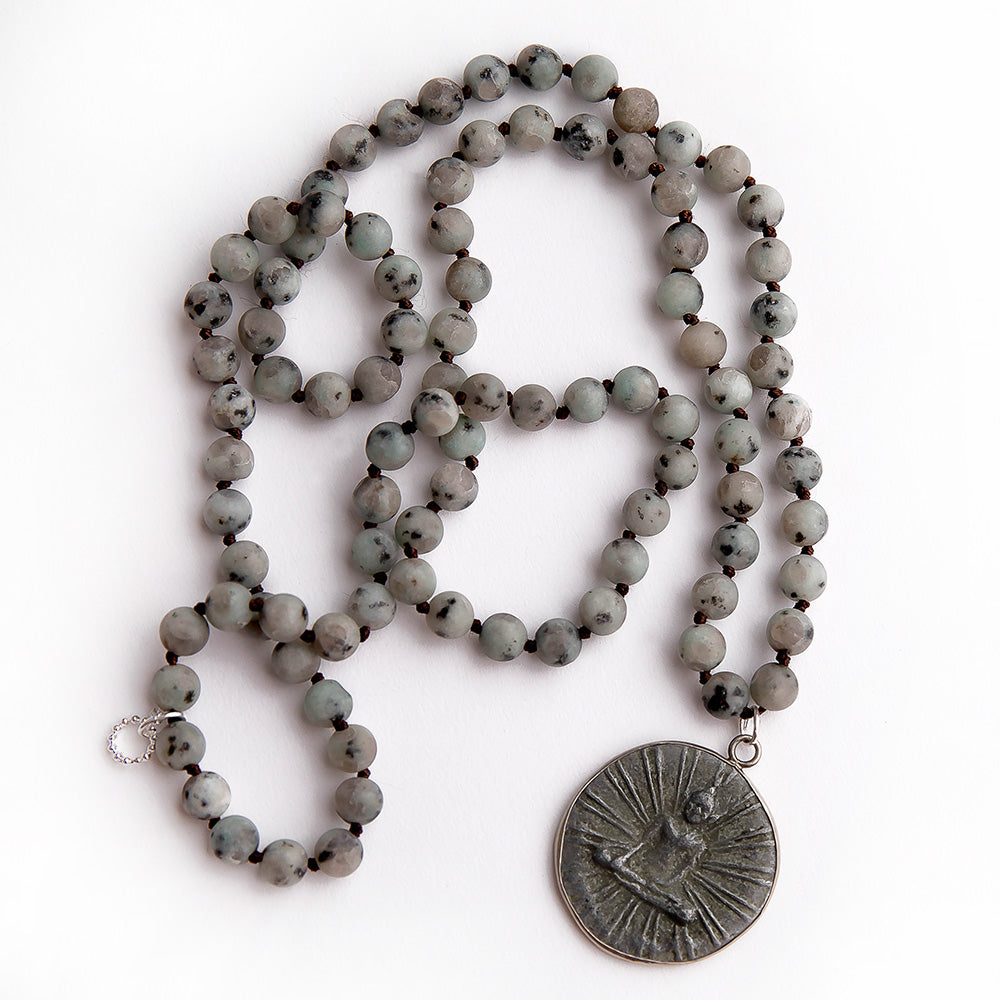 Kiwi jasper hand tied gemstone necklace paired with a slate Buddha pendant