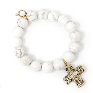 12mm Creamy White Howlite paired with a bronze 4-Way Cross