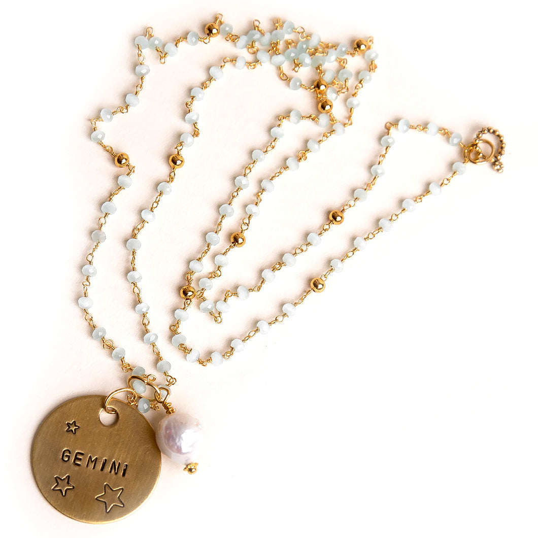 Aqua quartz rosary chain necklace with pearl accent and hand stand bronze Gemini medal