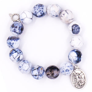 Faceted stormy agate with St. Michael the Protector medal
