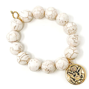 Creamy white howlite featuring our Patriot Medal