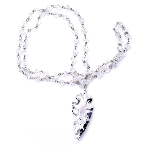 Clear quartz with silver arrowhead