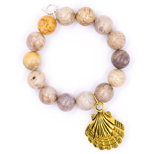 Fossil coral with brass shell medal