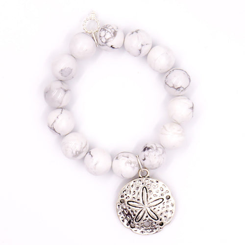 Bright white howlite with silver sand dollar medal
