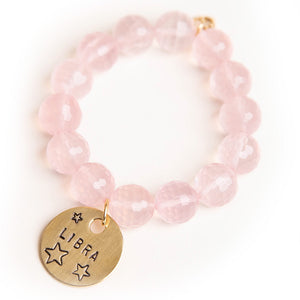 Faceted rose quartz paired with a bronze hand stamped Libra medal
