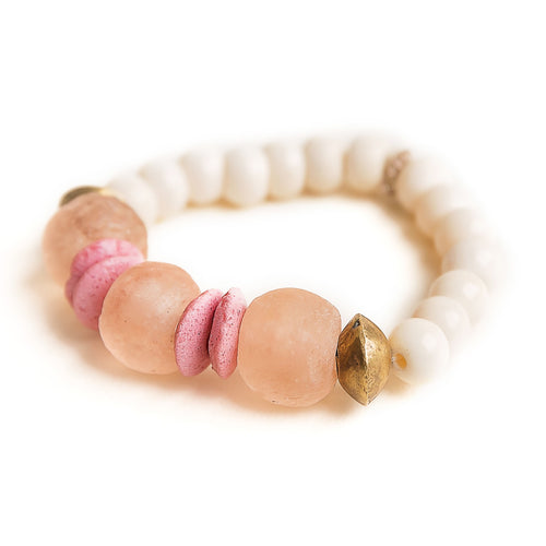 Blush sea glass paired with brass Ethiopian accents and hand carved bone beads