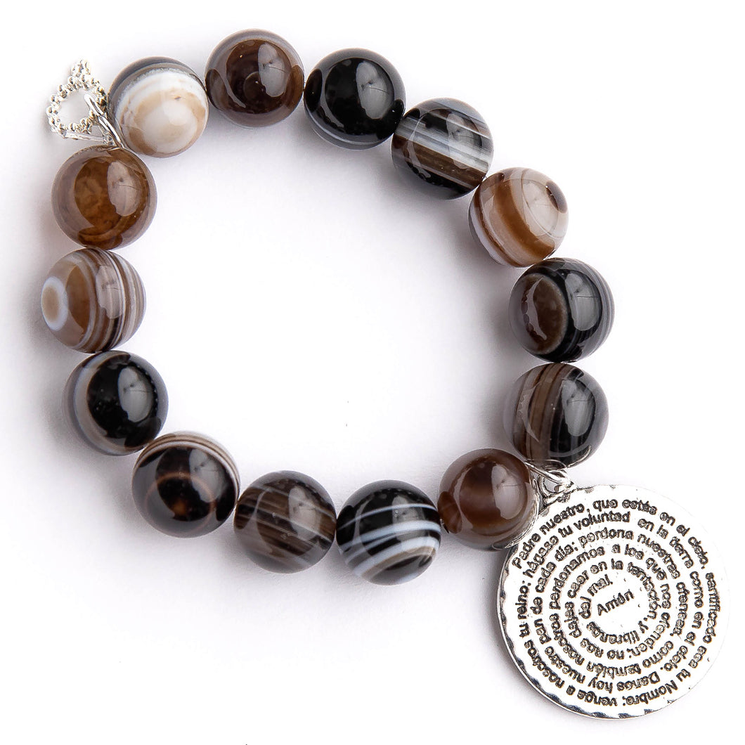 Brown swirl agate paired with the Lord's Prayer in Spanish