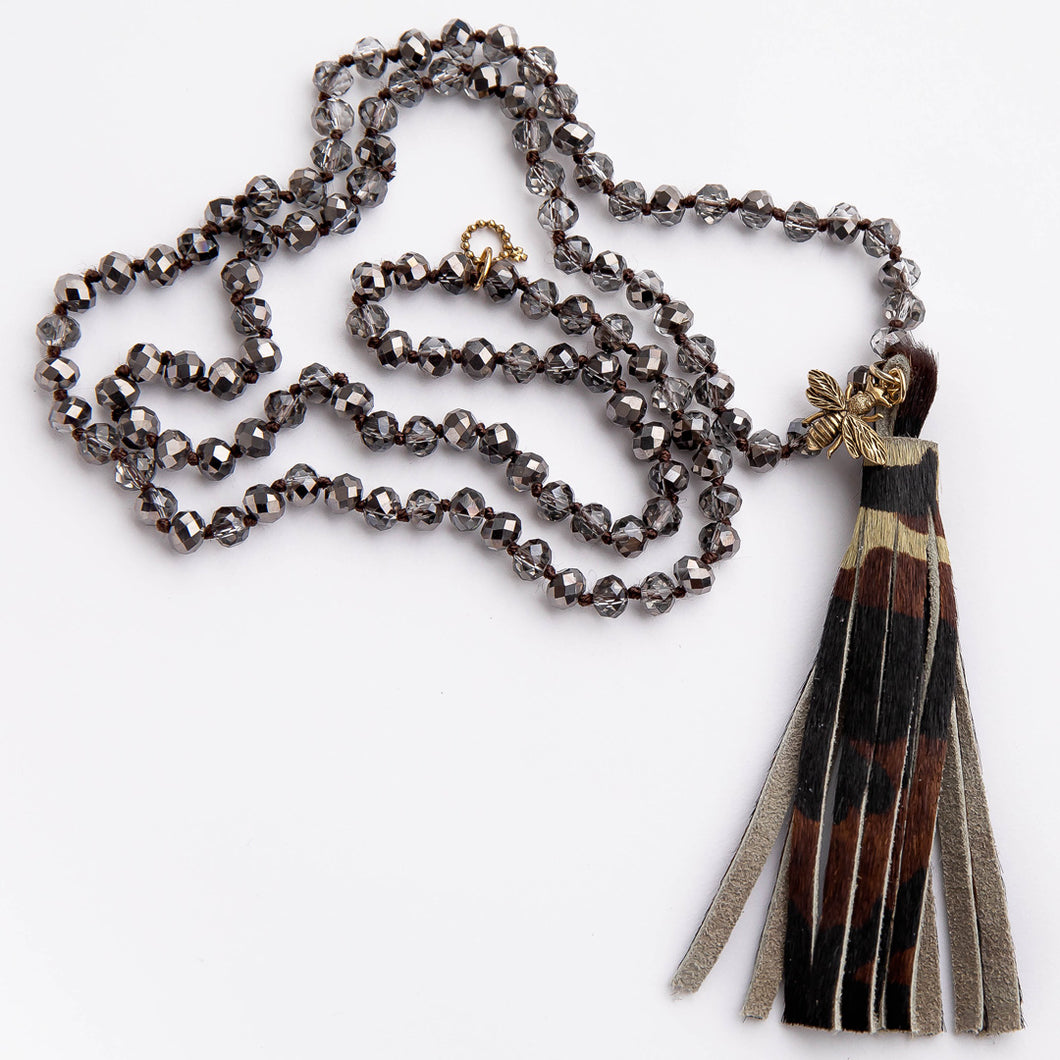 Faceted Light Grey Quartz hand tied necklace with leather camo tassel featuring a brass queen bee
