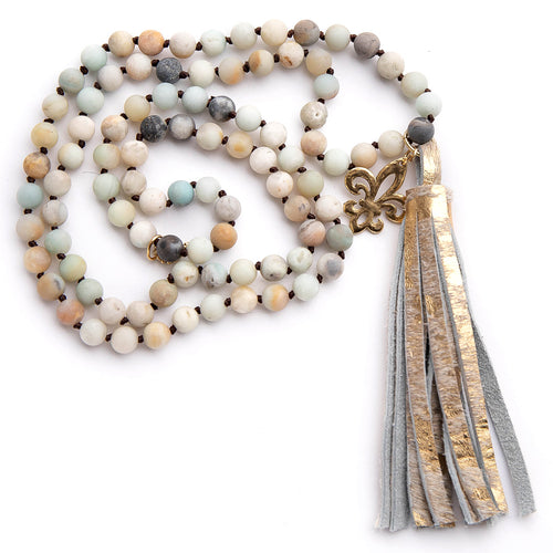 Hand tied matte amazonite gemstone necklace paired with a gold speckled leather cross featuring a hammered brass fleur de lis