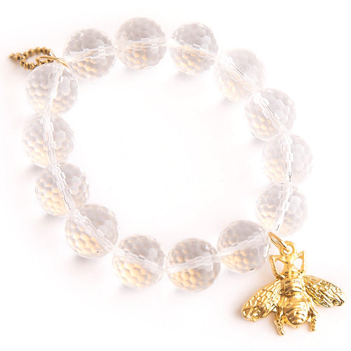 Clear cut quartz paired with a brushed bronze queen bee