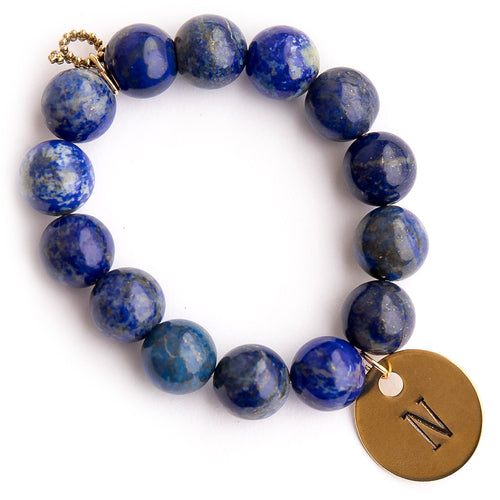 Lapis paired with a brass hand stamped initial medal