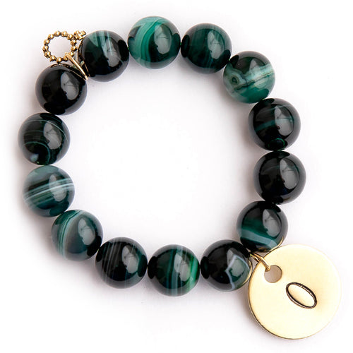Emerald green striped agate paired with a brass initial medal