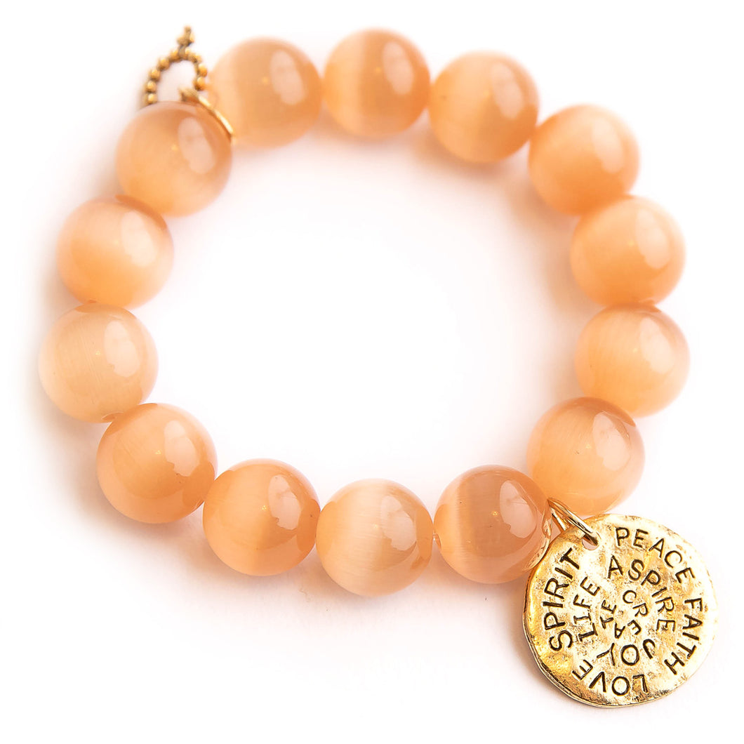 Cashmere calcite paired with bronze hammered spirit disc