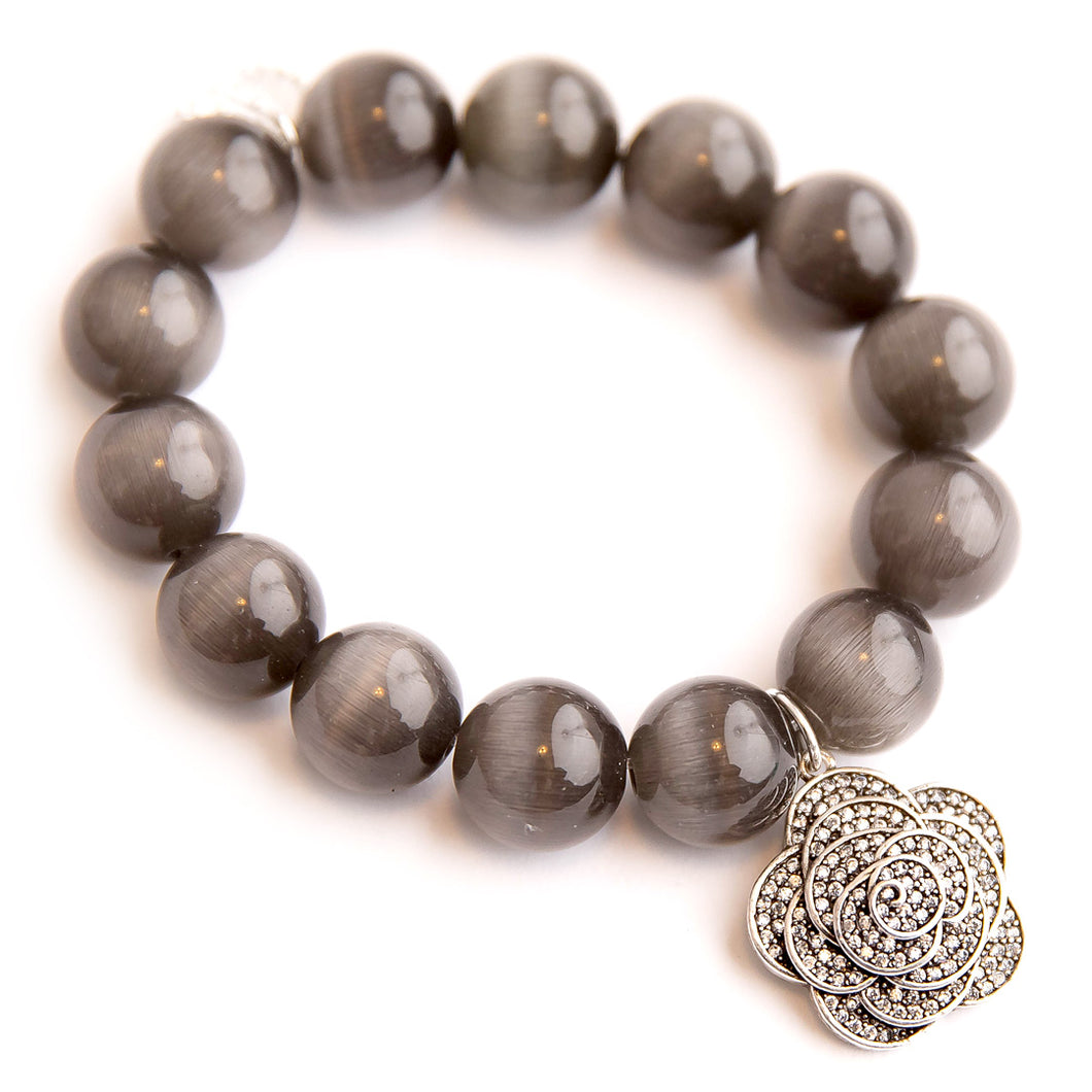 Black calcite paired with a Pave Flower