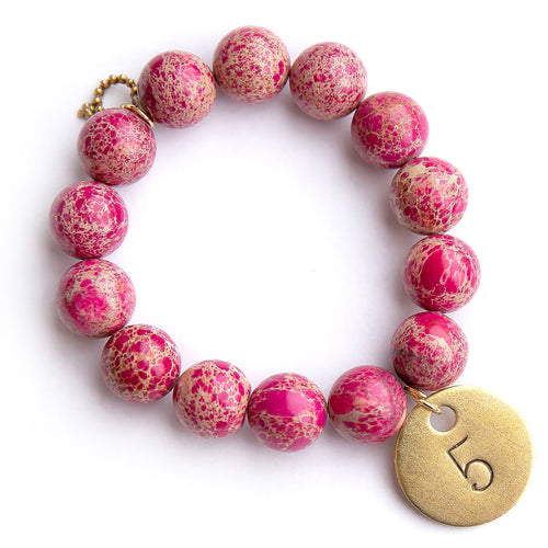 Pink sediment jasper paired with a brass hand stamped #5