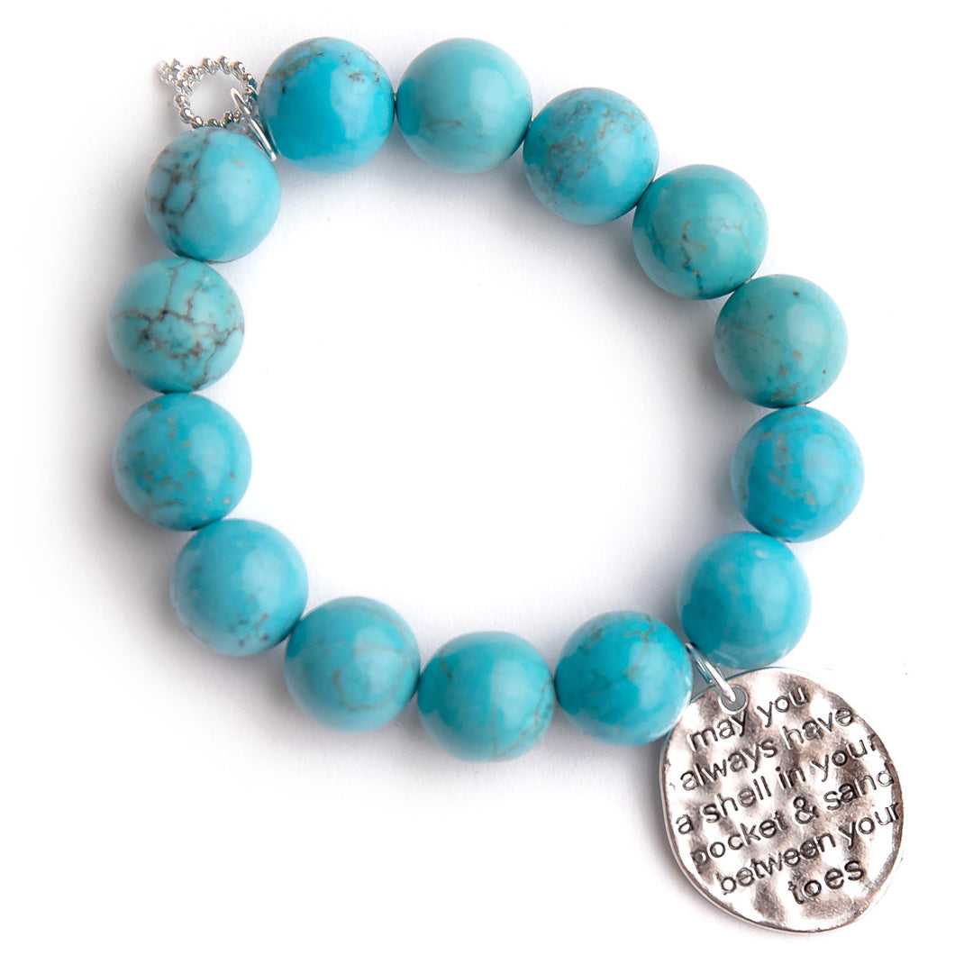 Blue howlite paired with a beachy medal