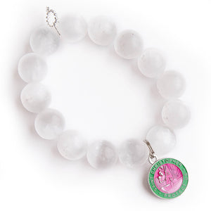 White calcite with pink & green enameled Saint Christopher