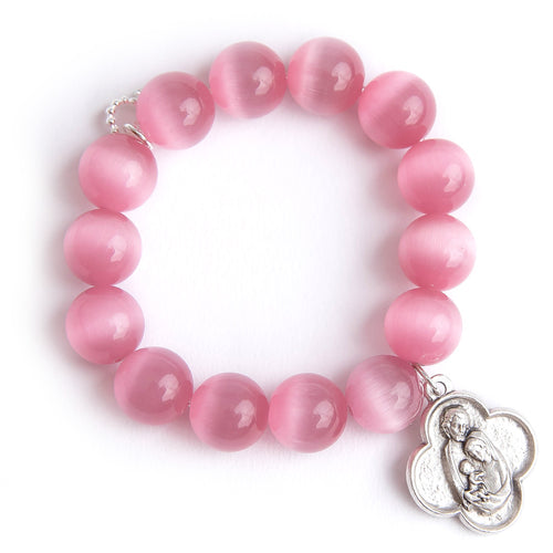 Blush calcite paired with silver scalloped Holy Family medal