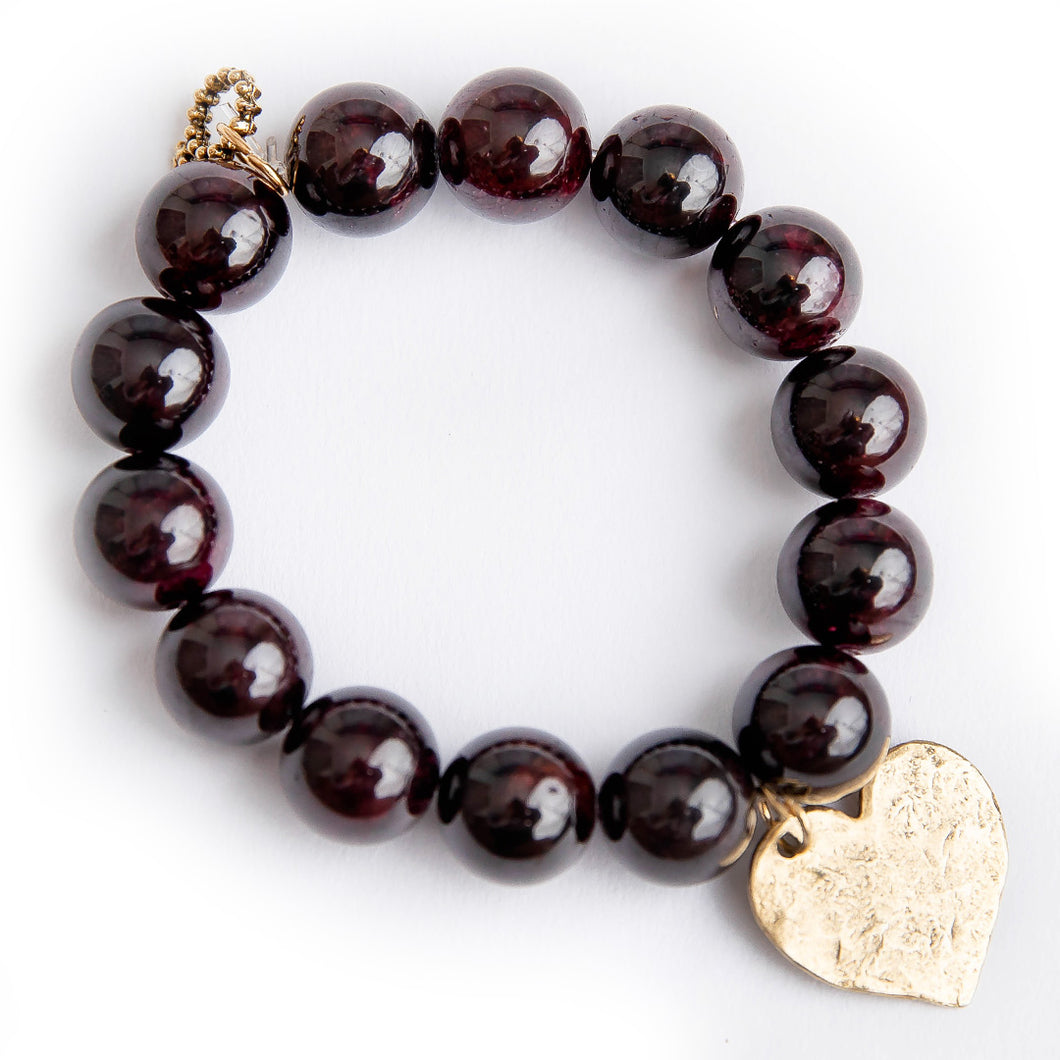 Garnet paired with a brass hammered heart