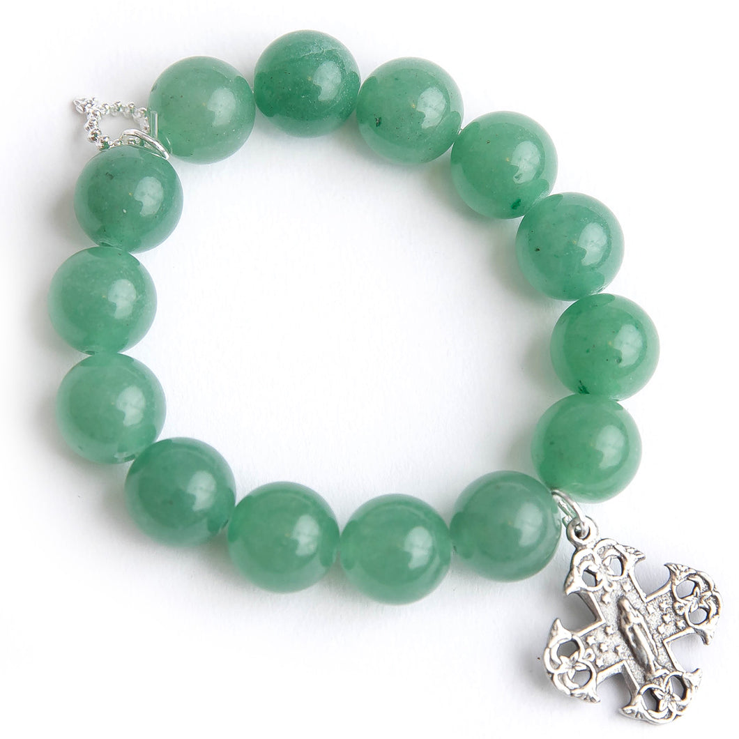 Green aventurine paired with a silver cross