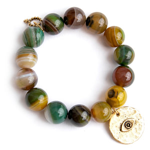 Chartreuse agate paired with a bronze hammered evil eye