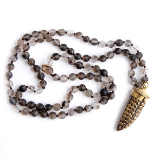 Hand tied matte grey owl quartz gemstone necklace with Ornate Protective Horn