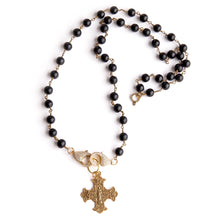 Black onyx convertible face mask necklace featuring an exclusively casted bronze Sacred Heart cross pendant