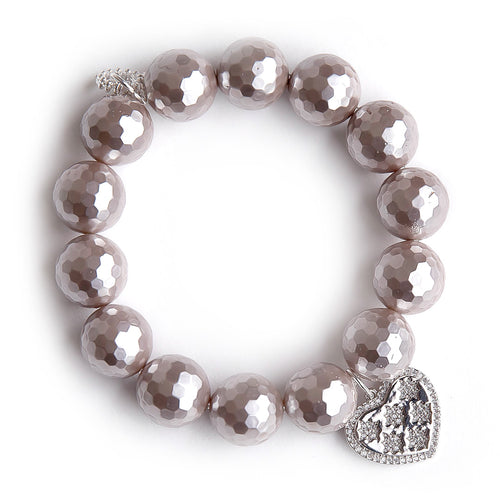 Mother of Pearl paired with a silver pave heart
