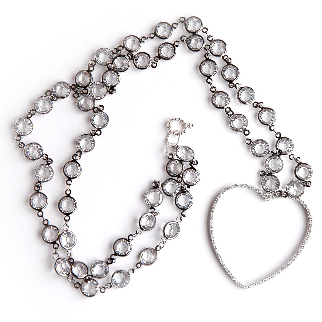 Clear quartz rosary chain paired with an open cut pave surround heart