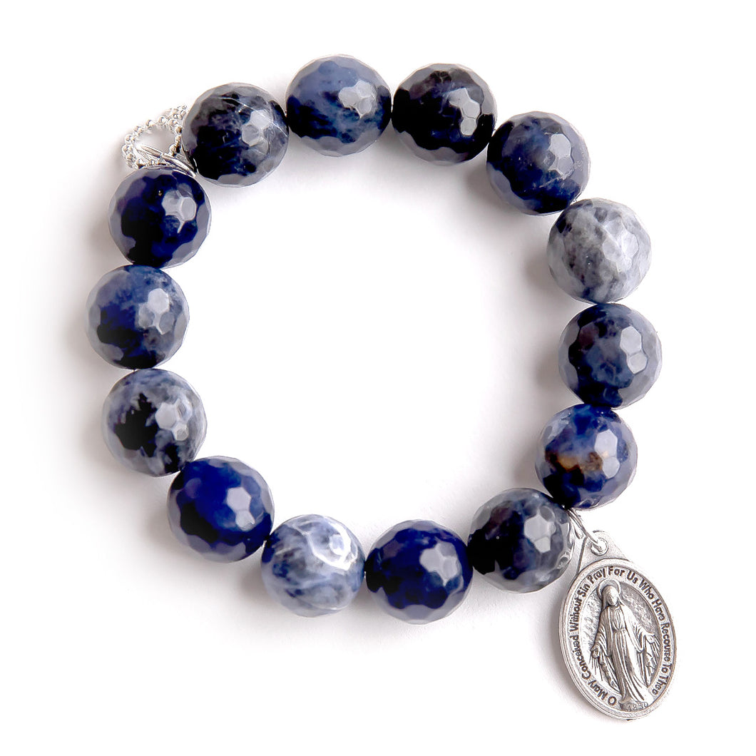 Faceted Dumortierite paired with an oval Blessed Mother medal