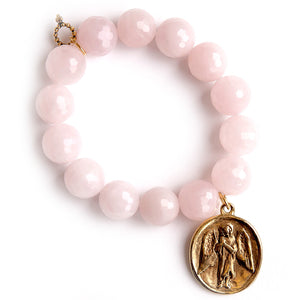 Faceted iridescent rose quartz paired with a bronze guardian angel medal