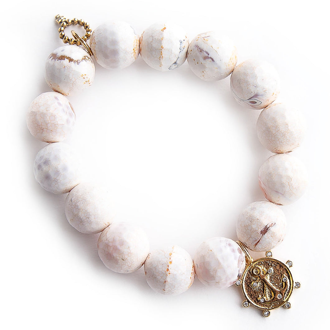 Honeycomb agate paired with a crystal surround anchor