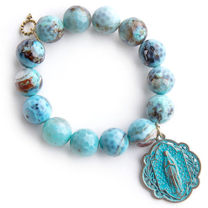 Faceted ocean reef agate paired with a patina Queen of Heaven